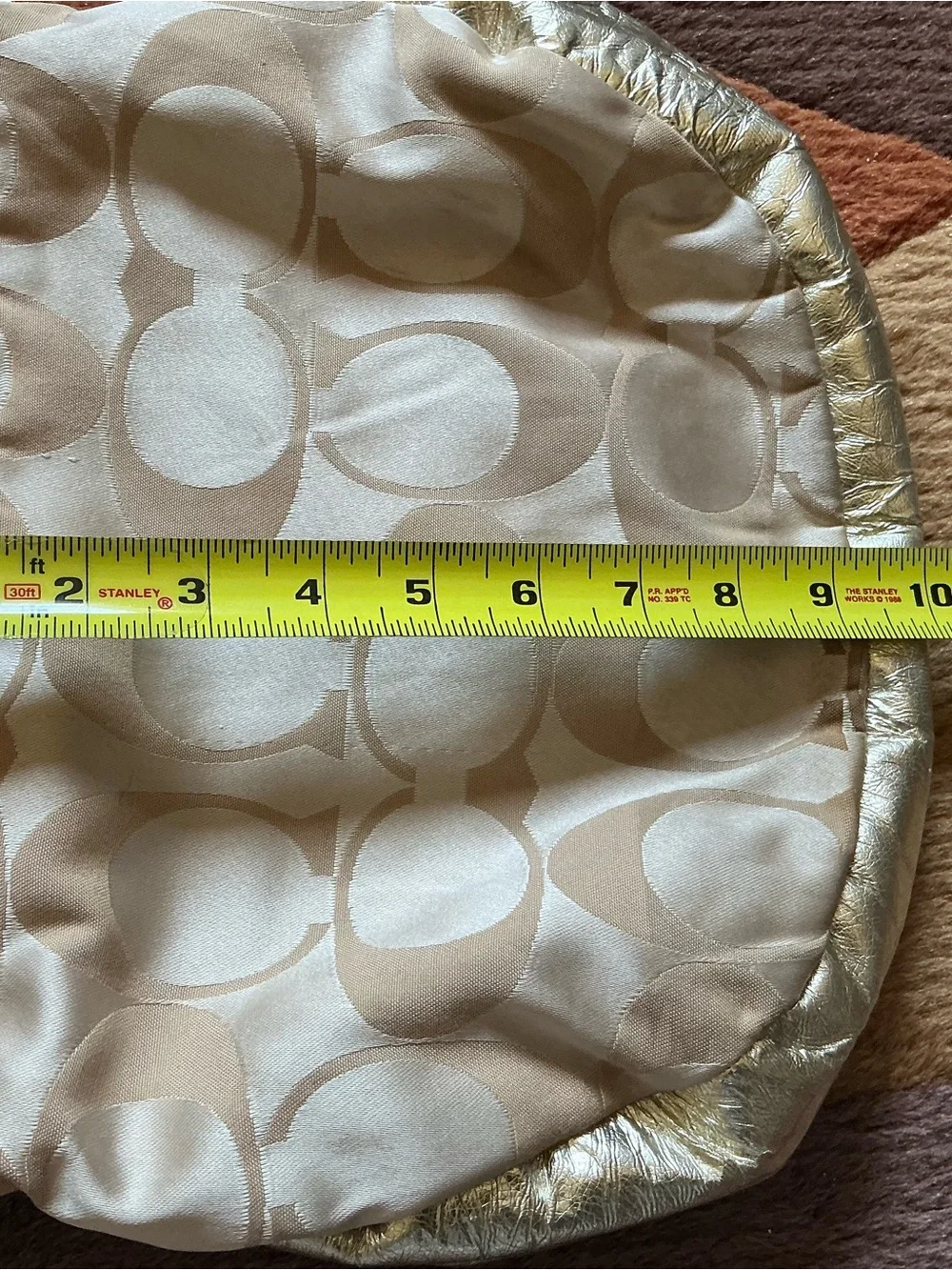 Coach beige logo